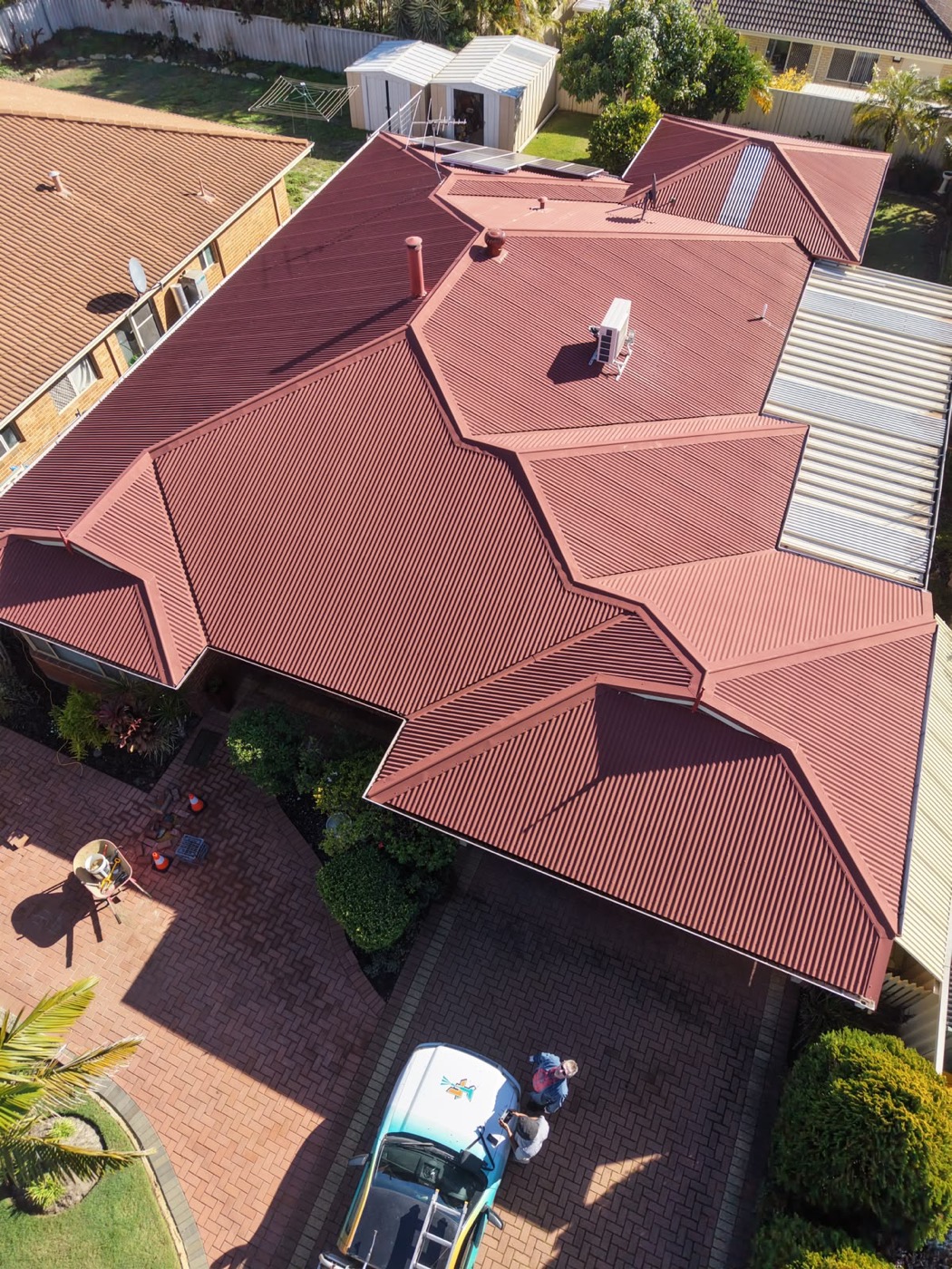 Terracotta roof before restoration, faded and weathered
